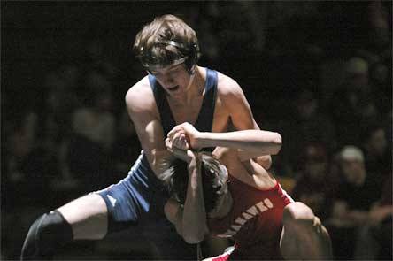 Hunter Amundson takes control of opponent Brandon Blevins en route to a 4-1 victory at 125 pounds.