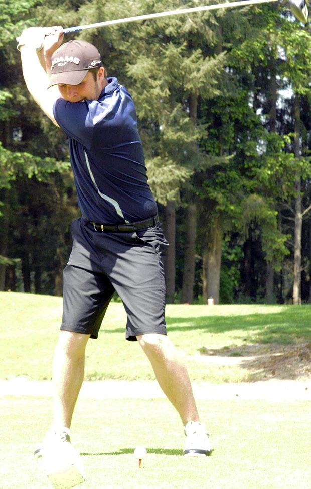 Arlington's Connor Stephens teeing off at the 3A district championships.