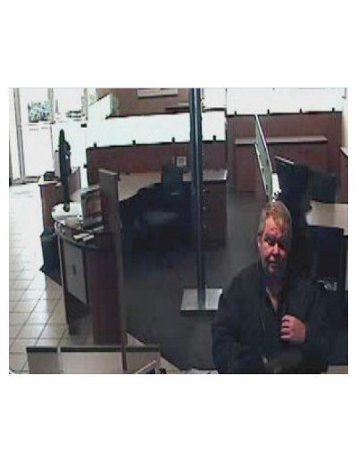 The person in this photo is wanted in connection to a robbery at the Arlington Branch of Chasae Brank on June 30.