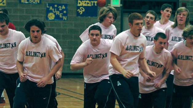 Last year’s Arlington boys basketball team wore pink warm-up t-shirts to support the fight against cancer.