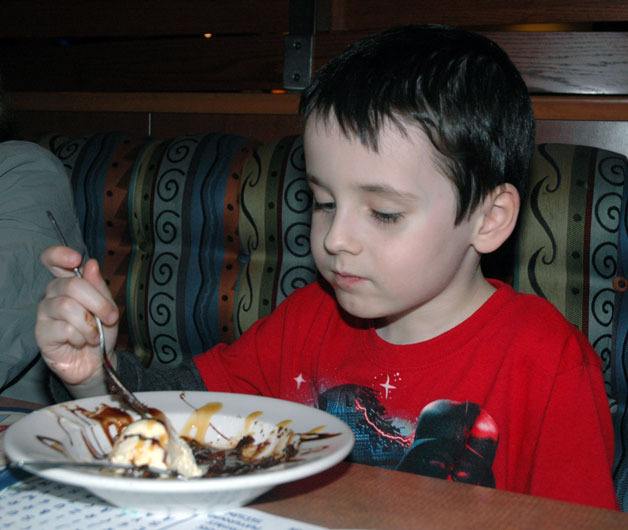 Arlingtonâ€™s Marcus Klammt enjoys his dessert at Bostonâ€™s Gourmet Pizza Restaurant in Lakewood on Feb. 21