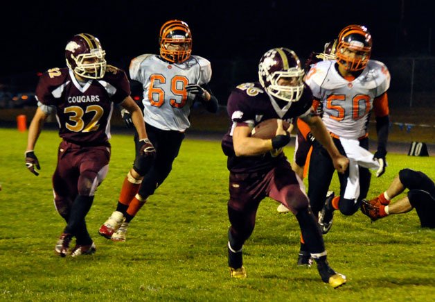 Lakewood running back Donovan Evans carries the ball during the Cougars’ Oct. 19 game against Granite Falls