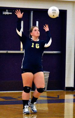 Arlington’s Shelby Shackelford serves during the second set of the team’s Oct. 18 game against Lake Stevens High School.