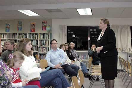 Arlington Superintendent Kris McDuffy talks to community members and school staff during her state of the district address on Jan. 29.