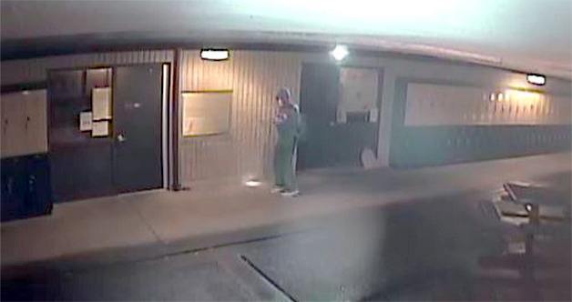 Video screen shot of suspect in burglary at Post Middle School in Arlington.