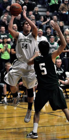 Arlington senior Griffin Ginnis goes for two of his team-high 21 points.