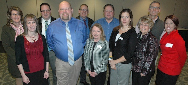 The Arlington-Smokey Point Chamber of Commerce Board of Directors for 2014. Back row from left