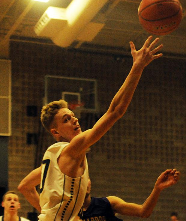 The Arlington boys basketball team defeated Oak Harbor 66-40.