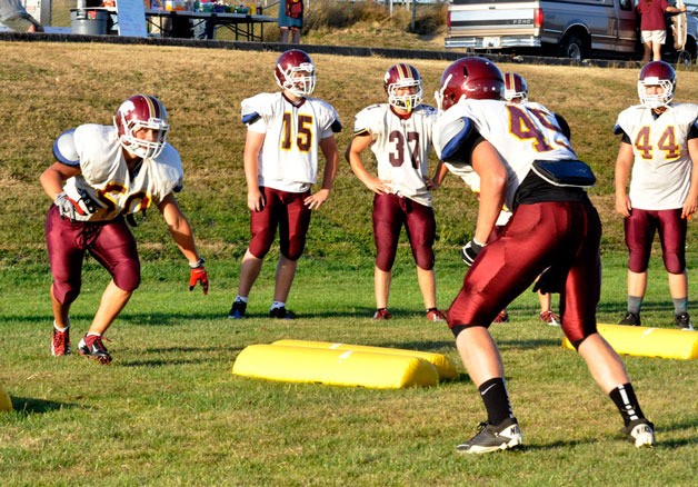 Members of the Lakewood High School Varsity football team train for the upcoming season. Their first game is set for Aug. 31
