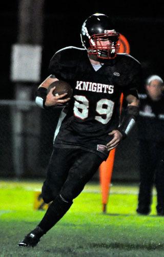 Junior Nels Knutson chooses which hole to run through.