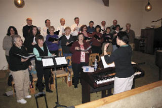 Laurie Breon directs about 20 singers who comprise Our Savior’s Lutheran Church’s choir