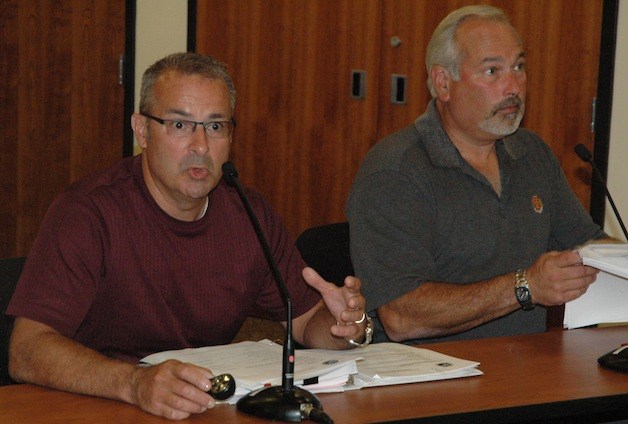 Chris Young and Paul Ellis explain the Planning Commission's proposal to the Arlington City Council Aug. 11.