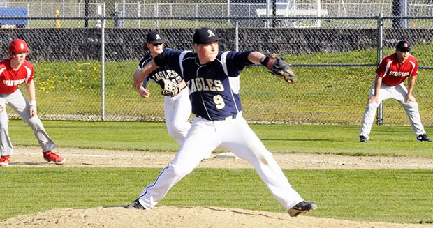 An Arlington pitcher throws against Stanwood.