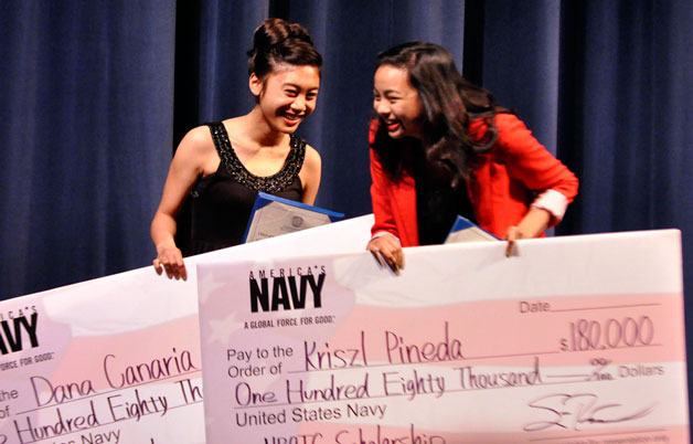 Dana Canaria and Kriszl Pinede grin after receiving Navy ROTC Scholarships amounting to $180