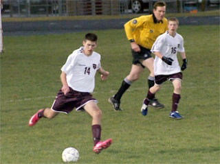 Senior Craig Hooks strides with the ball in Lakewoodâ€™s March 23 game against South Whidbey.