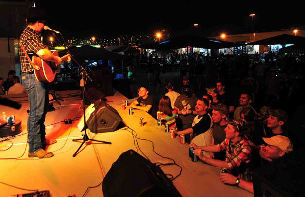Arlington’s Jesse Taylor entertains U.S. Navy sailors from USS John C. Stennis and Carrier Strike Group Three during a port call to the United Arab Emirates in March.