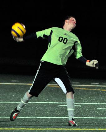 Lakewood sophomore goalkeeper Sam Roe throws a pass to a teammate after making a save. Roe was busy with six saves against Sultan.