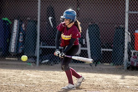 Sophomore Arianna Barrio tries to slap a base hit in the third inning.