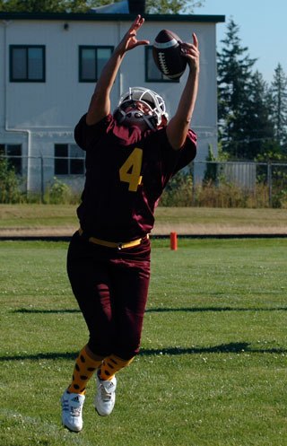 Dana Kruger earned MVP honors as she and the Lakewood moms shutout the Arlington moms 16-0 in a Powder Puff football game that raised more than $5