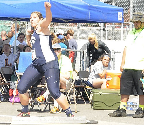 Justean Landis attempts the shot put during the 3A State Tournament at Mount Tahoma High School.