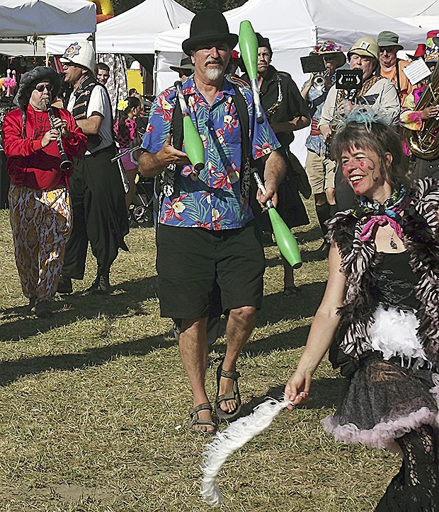 A colorful parade with funny characters was a highlight of the Festival of the River in Arlington Aug. 10.