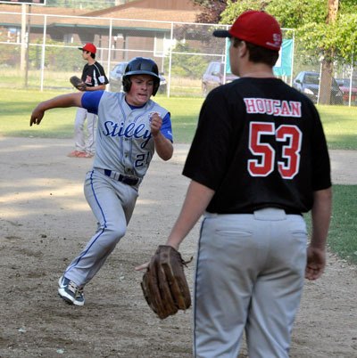 Mason Bergley rounds third base during the District 1 Little League All-Star Championship game on July 9 at Evans Field in Arlington.
