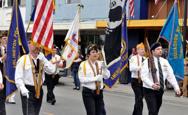 Members of the American Legion Post 76 participate in Arlington’s annual Memorial Day parade on Olympic Avenue on Monday