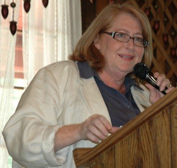 Arlington Mayor Barbara Tolbert addresses the Stllaguamish Valley Pioneers during their annual picnic.