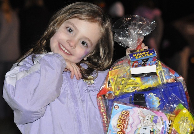 Bayleigh Ivester showed off the Easter basket that she won during last year’s Arlington Flashlight Easter Egg Hunt.