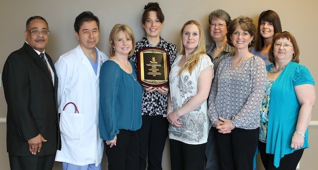 Cascade Valley Hospital Wound Care and Hyperbaric Medicine Center staff receive a 'Center for Excellence' award for 2013.