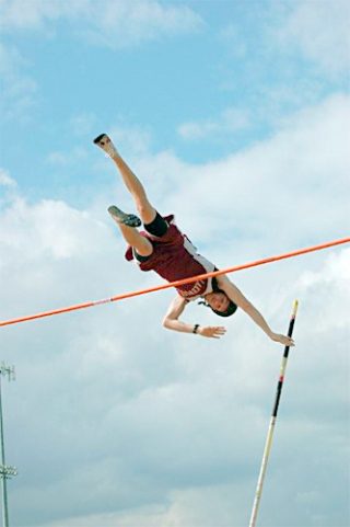 Lakewood senior Spencer Hulslander clears 13 feet en route to a 14-1 leap in the pole vault