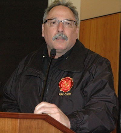 Arlington Fire Chief Bruce Stedman explains the SNOPAC managed laptop program to Arlington City Council members on March 3.