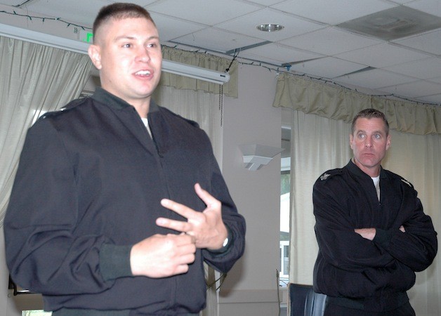 Devin Harris and Gregory Wolf of Naval Station Everett address the Retired Old Men Eating Out.