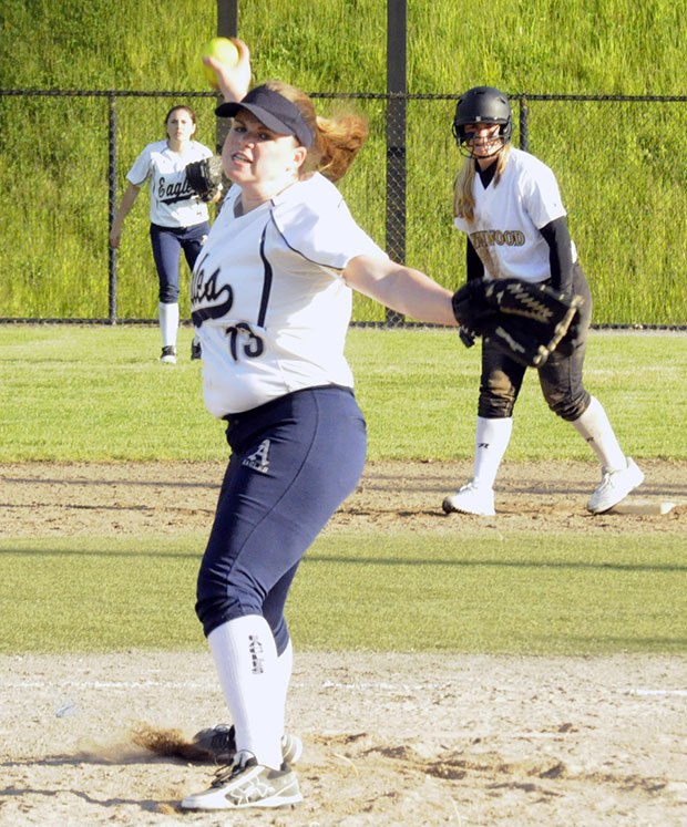 Arlington's Maddie Maclean winds up to pitch.