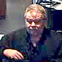 This robbery suspect was captured on surveillance video at the Chase Bank in Arlington at approximately 4:20 p.m. on June 30.