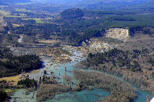 This aerial photograph shows how the hillside slid into the Stillaguamish River.