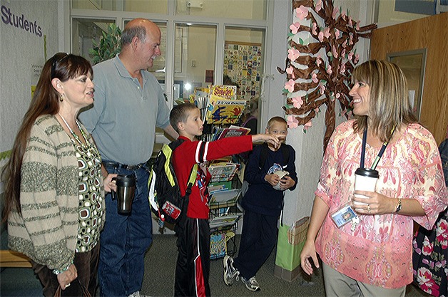 Students get ready for school at Presidents Elementary in Arlington.