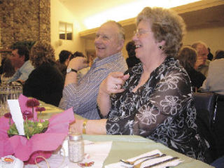 Roy and Darlene Strotz show their support for the dairy industry by attending the Snohomish County Dairy Ambassador Coronation held at the Stanwood-Camano Senior Center April 19.