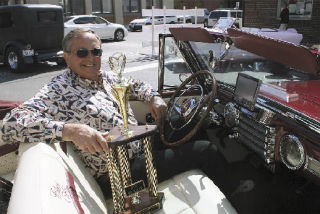 Arlington’s Grant Jensen gets ready to drive away with the Best in Show trophy