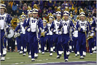 The University of Washington Husky Band is famous for its unique relationship with the cheer squad. They will perform with the AHS Eagle Band at the football game against Monroe Friday