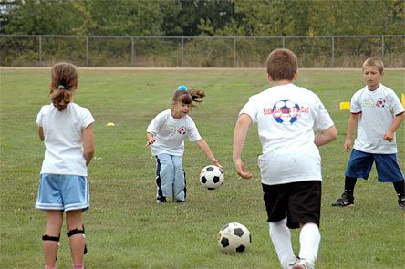 Seven-year-old Arlington resident Kaiya Stauffer reaches for the ball