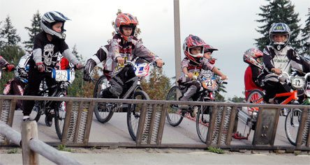 Riders wait to begin their BMX race at McCollum Park in Everett.