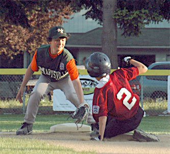 Dick’s Towing shortstop Collin Holeman reaches down to tag the Granite Falls Diamondbacks leadoff batter as he tries stealing second. Holeman got the out.