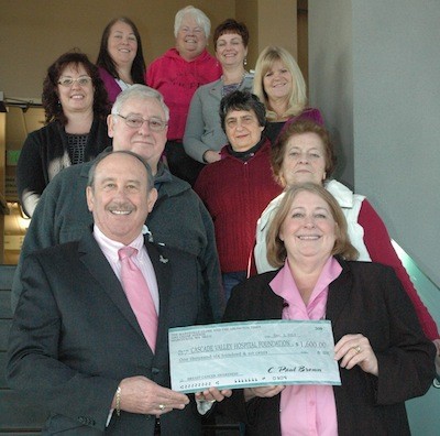 The Cascade Valley Hospital Foundation receives a check for $1