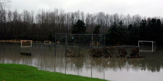 The soccer fields of Twin Rivers Park just east of Arlington were partially swamped by noon on Jan. 17