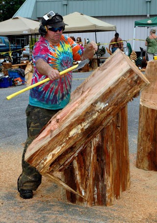 “Chainsaw Jack” McEntire shows that he’s just as skilled with an ax at Arlington’s first Country Chainsaw Carvers Event Sept. 17.