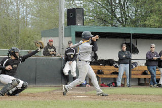 Arlington senior Cameron Hanson judges a pitch unhittable and holds his bat at the last second. At Skagit Valley College Arlington 0 0 1 0 0 0 0 1 Lynnwood 1 0 1 1 2 0 x 5
