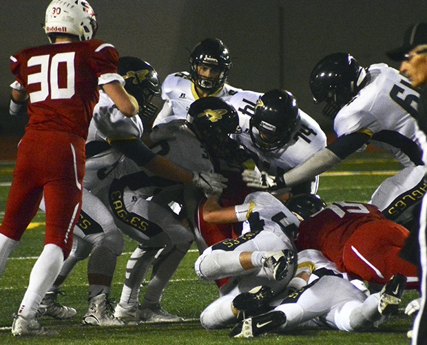 Brandon Adam/Staff Photo                                The Arlington defense was a highlight in its last football game of the season.