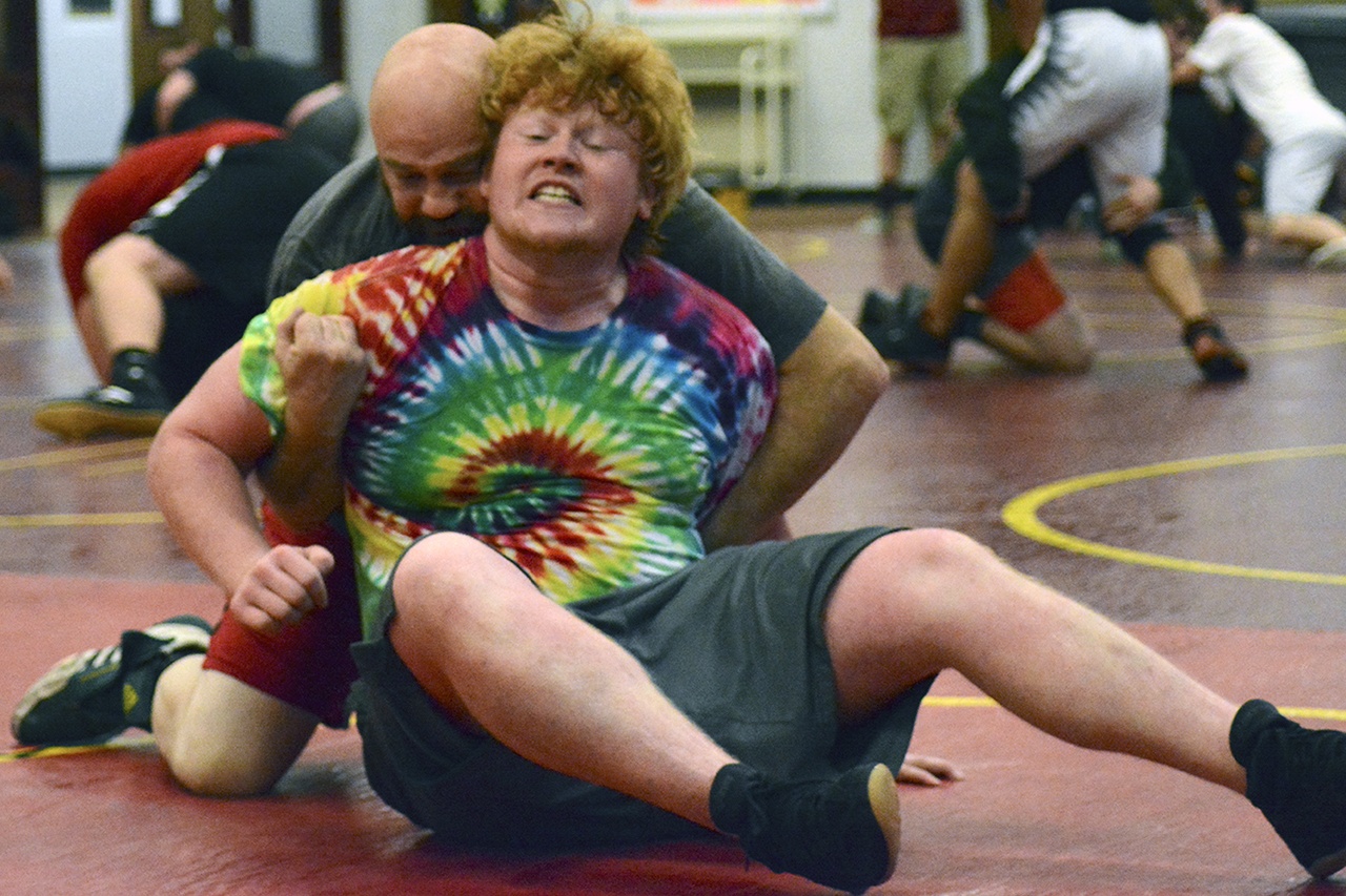 Brandon Adam/Staff Photo                                Lakewood Trevor Chase spars with his coach Tom O’Hara at a winter practice