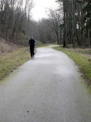 A runner heads north on the Centennial Trail between Arlington and Lake Stevens. The north section of the Centennial Trail is a new addition to the second edition of Hiking Snohomish County by Ken Wilcox